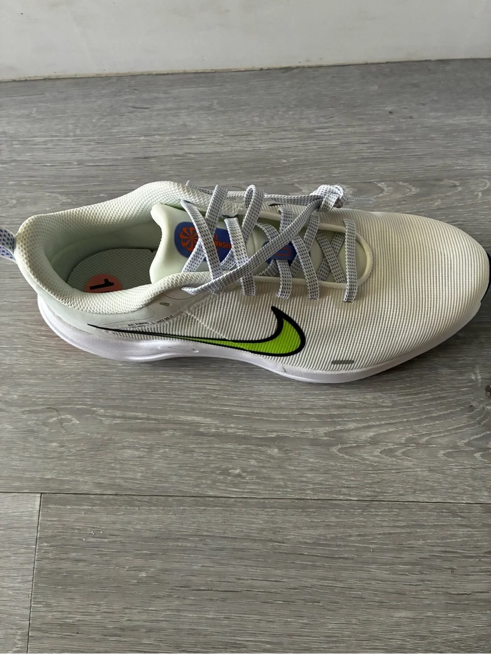 Nike Kids White Sneakers with Neon Lime Swoosh and Blue-White Laces